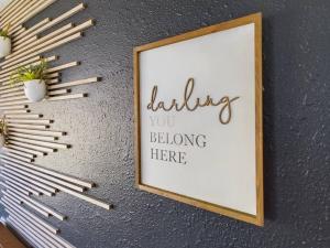 a picture of a sign on a wall with matches at OSU Pet Perfect in PNW in Corvallis