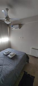 Ένα ή περισσότερα κρεβάτια σε δωμάτιο στο Departamento Calchines con cochera +13 φωτογραφίες