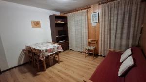Postel nebo postele na pokoji v ubytování Residence Marmolada + 37 fotografií