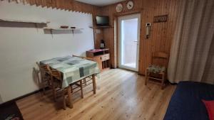 TV a/nebo společenská místnost v ubytování Residence Marmolada