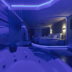 Postel nebo postele na pokoji v ubytování Hotel Rosa Blu