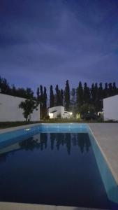 Swimmingpoolen hos eller tæt på Posada Del Montañés Cabañas