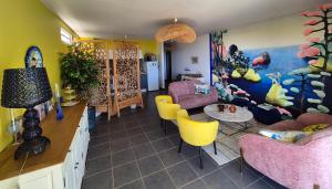 Posezení v ubytování New Paradise - appartement avec vue Moorea