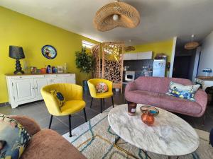Posezení v ubytování New Paradise - appartement avec vue Moorea