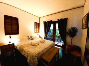 Letto o letti in una camera di MOOREA - Villa Ana Mua
