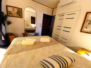 Letto o letti in una camera di MOOREA - Villa Ana Mua