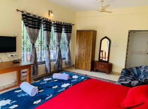 Voodi või voodid majutusasutuse The Bodhi Tree Resort toas
