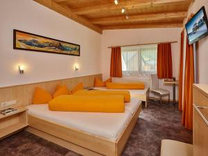 Postel nebo postele na pokoji v ubytování Haus Gritsch + 32 fotografií