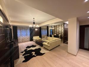 Posezení v ubytování Conta Apartment