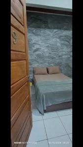 Postel nebo postele na pokoji v ubytování Ap9 - Confortável e Aconchegante - Apartamentos Paraíso