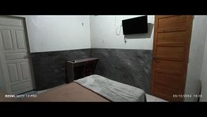 TV a/nebo společenská místnost v ubytování Ap9 - Confortável e Aconchegante - Apartamentos Paraíso