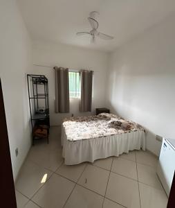 Postel nebo postele na pokoji v ubytování Casa com 2 quartos perto do Buritis