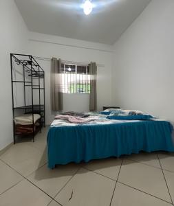 Postel nebo postele na pokoji v ubytování Casa com 2 quartos perto do Buritis