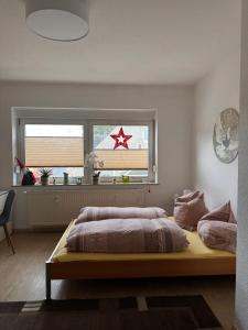 Katil atau katil-katil dalam bilik di Einfamilienhaus unterm Dach