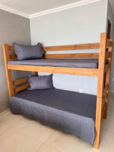 Postel nebo postele na pokoji v ubytování Recanto do Leste