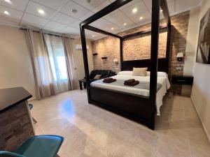 Postel nebo postele na pokoji v ubytování Hotel Don Juan