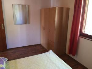 Postel nebo postele na pokoji v ubytování Apartments Durda