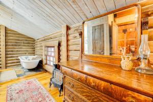 a bathroom with a sink and a tub in a room at about 13 Mi to Main St Park City Cabin with Mtn Views! in Park City +27 photos