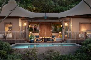 Πισίνα στο ή κοντά στο Nekajui, a Ritz-Carlton Reserve