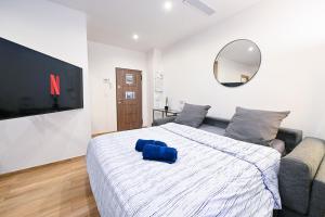 Ένα ή περισσότερα κρεβάτια σε δωμάτιο στο Beau studio cozy centre ville et plages avec terrasse n3