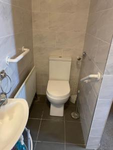 Koupelna v ubytování Coast Road Apartment + 5 fotografií