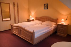 Postel nebo postele na pokoji v ubytování Hotel Schwarzes Ross