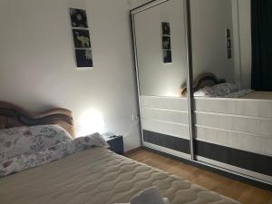Voodi või voodid majutusasutuse Ria apartman toas