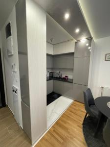 Kuchyň nebo kuchyňský kout v ubytování Ria apartman + 10 fotografií