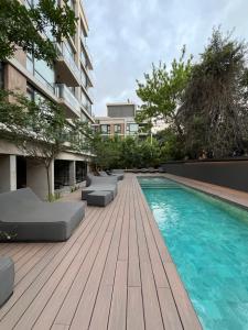 Swimmingpoolen hos eller tæt på EXCEPCIONAL DOS AMBIENTES ZONA GÜEMES, Mar del Plata