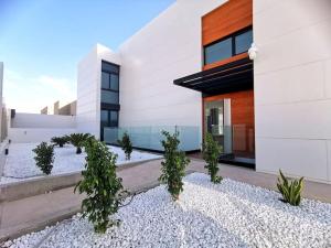 a rendering of a house with plants in front of it at Villa Las Palmas de Gran Canaria in Telde