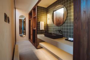 Koupelna v ubytování Hotel Alaia