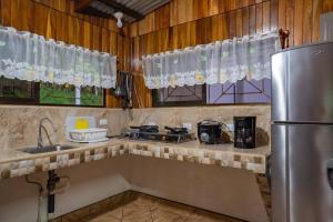 Kuchyň nebo kuchyňský kout v ubytování Hospedaje Rancho mi Tata