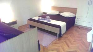 Postel nebo postele na pokoji v ubytování Apartments Mira