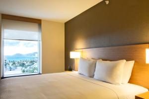Postel nebo postele na pokoji v ubytování Hyatt Place Los Cabos