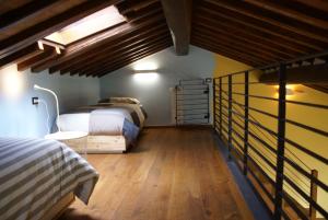 Postel nebo postele na pokoji v ubytování Sunset Barga Toskana Kürzlich Renoviert