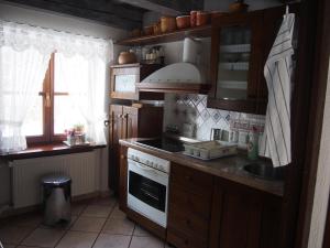 Kuchyňa alebo kuchynka v ubytovaní Chalúpka pod Lipkami