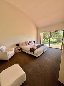 En eller flere senge i et værelse på Coastal Retreat at Cape Schanck