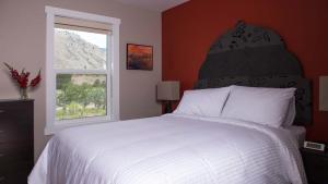 Katil atau katil-katil dalam bilik di Klippers Guest Suites