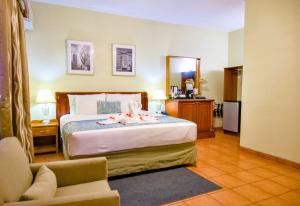Postel nebo postele na pokoji v ubytování Rolson Hotel + 37 fotografií