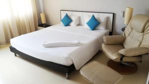 Postel nebo postele na pokoji v ubytování S2S Queen Trang Hotel