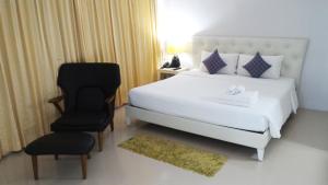 Postel nebo postele na pokoji v ubytování S2S Queen Trang Hotel