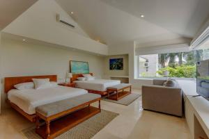 Ένα ή περισσότερα κρεβάτια σε δωμάτιο στο Dream House with private Deck in Puerto Aventuras