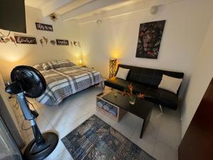 Giường trong phòng chung tại Pool Suite Finca El Remanso La Vega +18 ảnh