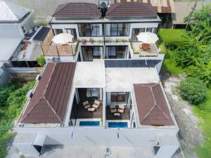 an aerial view of a house with a roof at Villa Rosie 1BR Brand New Villa In Kerobokan in Kerobokan