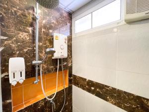Koupelna v ubytování Family Hotel