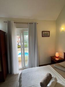 Postel nebo postele na pokoji v ubytování Villa Ray Manta 3-Bedroom 5mins Walk to Beach - LB1