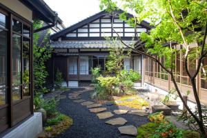 Vrt pred nastanitvijo 北国街道 脇本陣の宿 粂屋 1棟貸切プラン