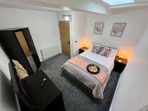 Postel nebo postele na pokoji v ubytování Harbourside Hot Tub Penthouse