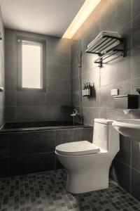 Kúpeľňa v ubytovaní Yuzhi Wenlv B&B