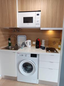 A kitchen or kitchenette at Casa del Mar Air-conditioned Apartment with Swimming Pools - Corralejo Playa